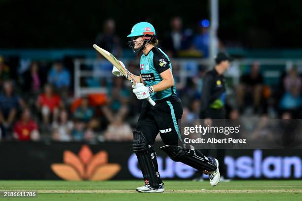 Jessica Jonassen of the Heat celebrates victory during the WBBL match between Brisbane Heat and Sydney Sixers at Allan Border Field on November 24 in...