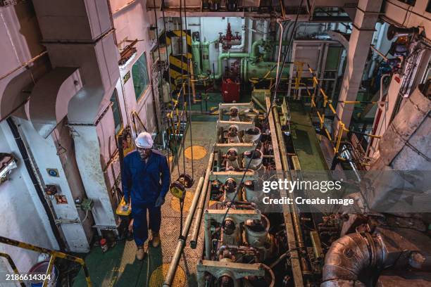 76 Crew Working In Engine Room On A Ship Stock Photos High Res 76-crew-working-in-engine-room-on-a-ship-stock-photos-high-res