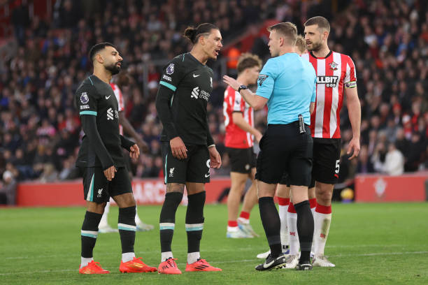 Referee Sam Barrott is confronted by Darwin Nunez of Liverpool after an incident with Jack Stephens of Southampton during the Premier League match...