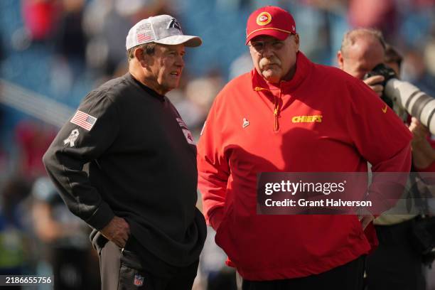 Head coach Andy Reid of the Kansas City Chiefs and defensive analyst Dom Capers of the Carolina Panthers talk prior to a game at Bank of America...