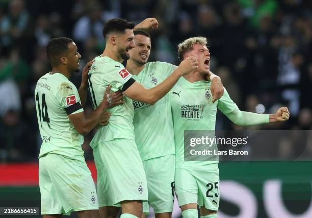 Tim Kleindienst of Borussia Moenchengladbach celebrates scoring his team's second goal with teammates Alassane Plea, Julian Weigl and Robin Hack...