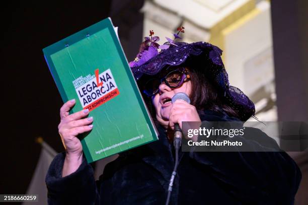 Woman dressed as a suffragette takes part in a rally in support of free and safe abortion in Warsaw, Poland on November 28, 2024. A dozen of women...