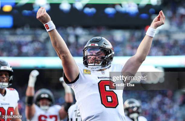 Baker Mayfield of the Tampa Bay Buccaneers celebrates after scoring a rushing touchdown against the New York Giants during the second quarter at...