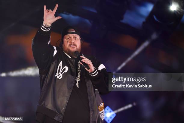 Jelly Roll performs music during halftime of an NFL football game between the Dallas Cowboys and the New York Giants at AT&T Stadium on November 28,...