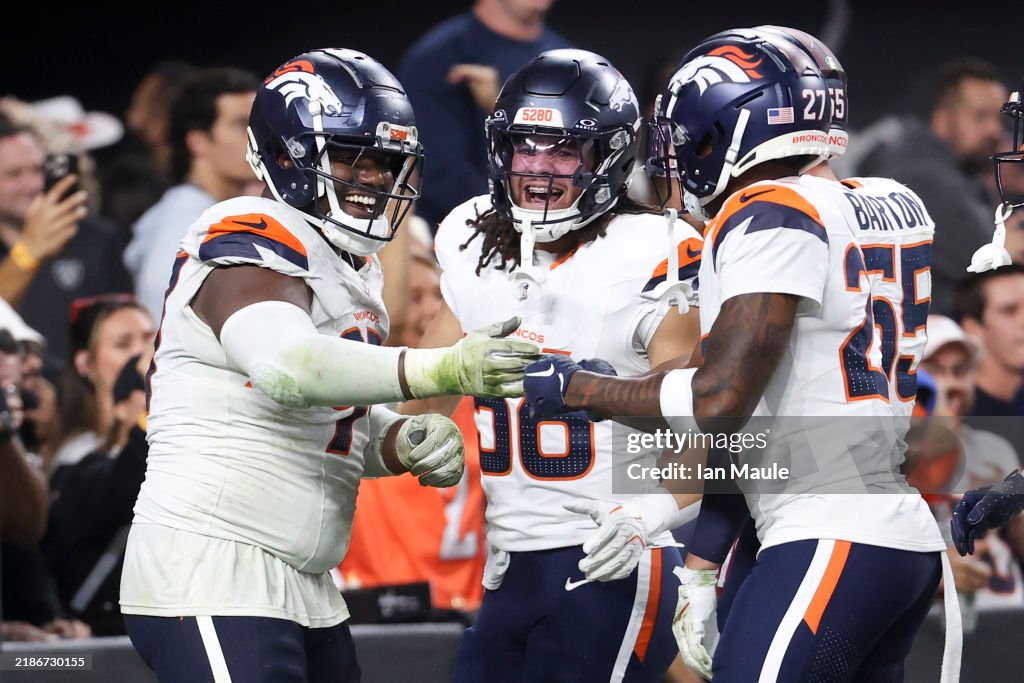 Malcolm Mathis Malcolm Roach, Levelle Bailey, and Damarri Mathis of the Denver... News ...