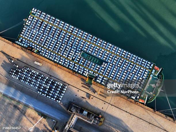 Large number of vehicles are ready to be shipped for export at the port of Lianyungang in Jiangsu province, China, on November 29, 2024.