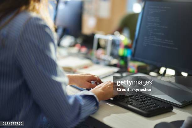 close up of a female programmer coding a language on pc in the office. - programmer computer stock pictures, royalty-free photos & images