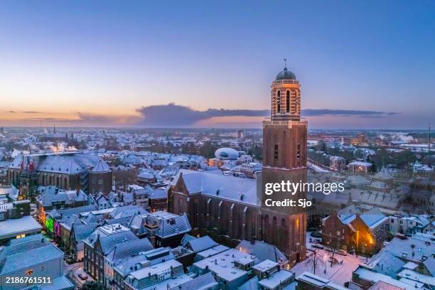 zwolle peperbus church tower during a cold winter sunrise - turret roof stock pictures, royalty-free photos & images