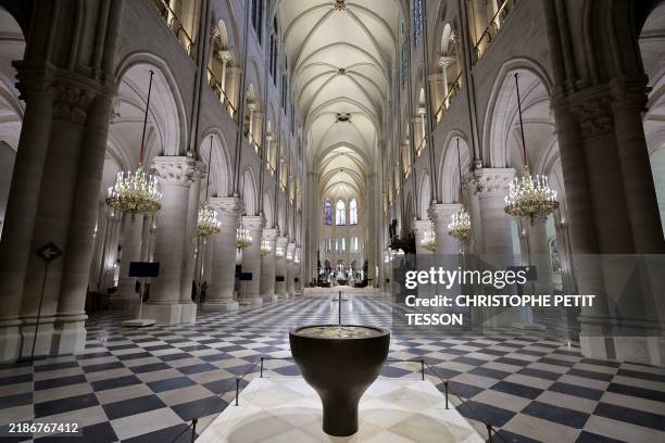 This photograph shows the baptistery of Notre-Dame de Paris cathedral, designed by French artist and designer Guillaume Bardet, in Paris on November...