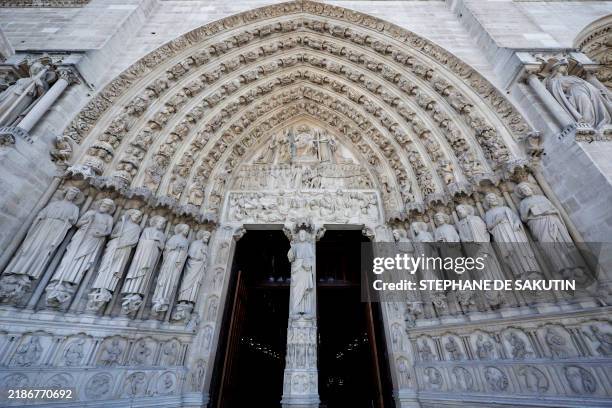 This photograph shows the bas-relief outside of Notre-Dame de Paris cathedral in Paris, on November 29, 2024. The Notre-Dame Cathedral is set to...