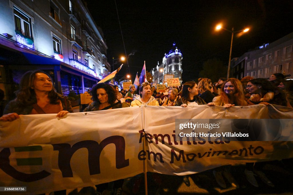 Addim Demonstrators parade behind a
