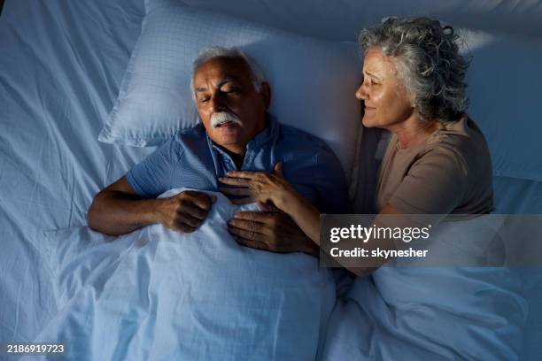 come on honey, please stop snoring! - snoring stock pictures, royalty-free photos & images