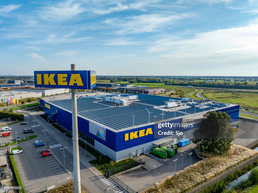 IKEA store with the IKEA name in yellow and blue seen from above
