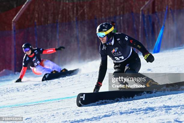 Bulgaria's Yankov Radoslav competes during the first round of the men's parallel giant slalom snowboard at the 2024-2025 ISF Snowboard Parallel World...