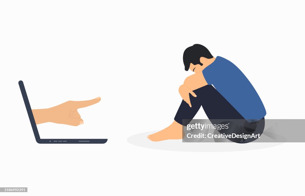 Cyberbullying, Internet Aggression And Online Abuse Concept. Side View Of Sad Man Sitting And Index Finger Outward From Laptop Monitor Pointing At Him