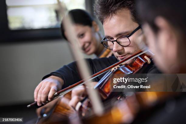 classical musicians at a rehearsal - play rehearsal stock pictures, royalty-free photos & images