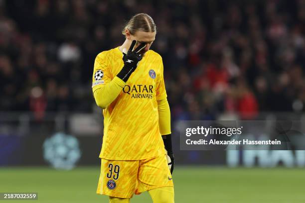 Matvey Safonov of Paris Saint-Germain reacts following a loss in the UEFA Champions League 2024/25 League Phase MD5 match between FC Bayern München...