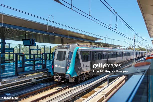 sydney's driverless metro train at kellyville station - underground rail stock pictures, royalty-free photos & images