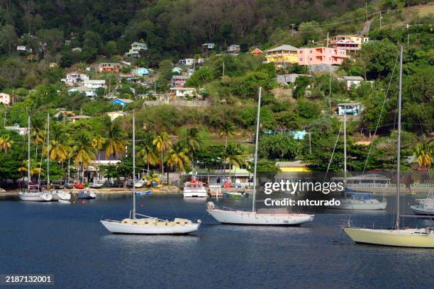 yachts moored in front of port elizabeth's downtown beach, bequia, saint vincent and the grenadines - port elizabeth city stock pictures, royalty-free photos & images