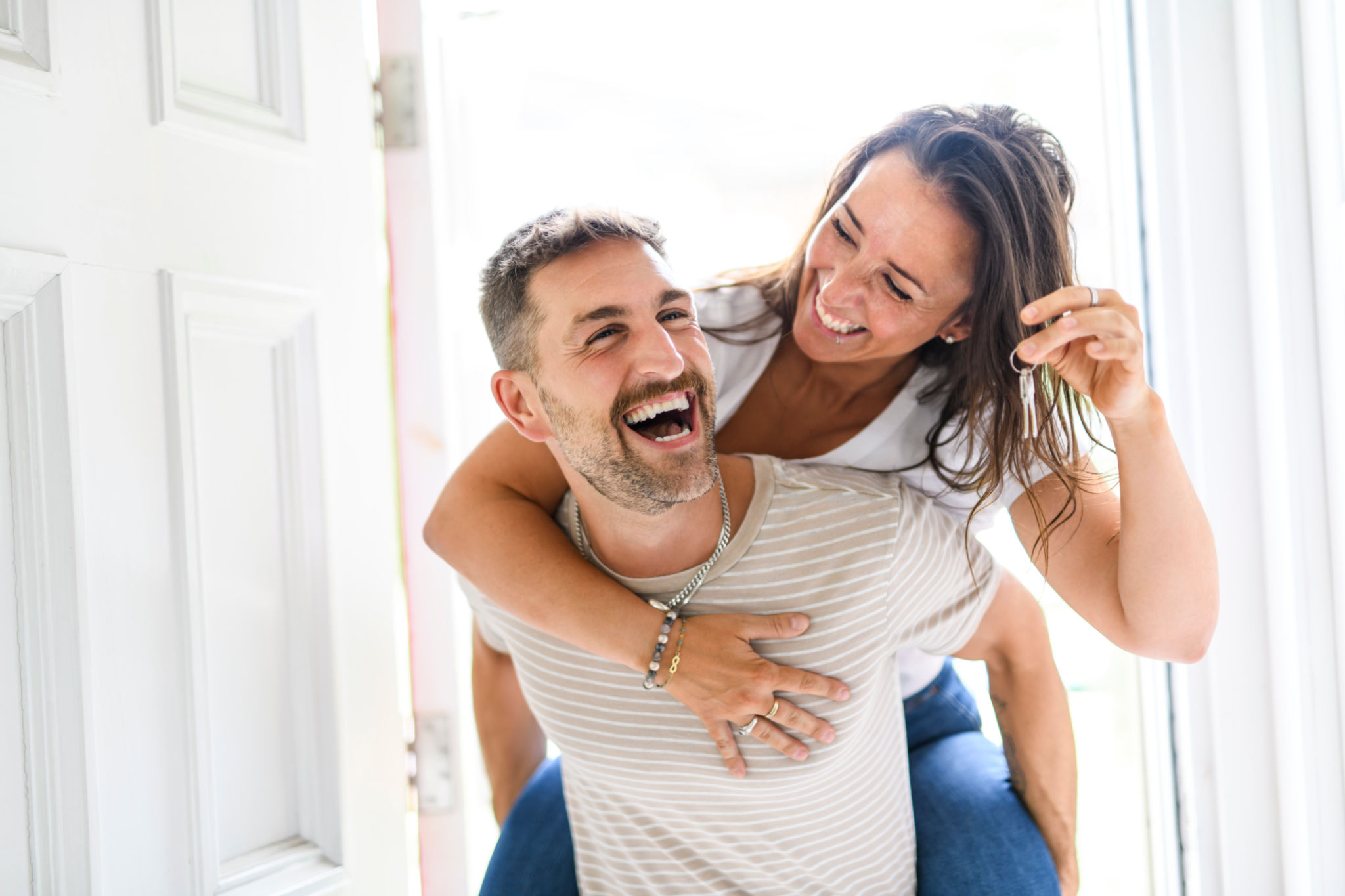 couple move into the home at new home. Relocation, moving to new home concept couple move into the home at new home. Relocation, moving to new home concept