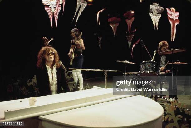 English rock band Mott The Hoople performing live at BBC Studios, circa 1973; they are Ariel Bender, Ian Hunter, Pete Overend Watts, Dale 'Buffin'...