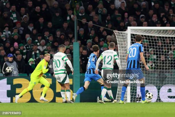 Cameron Carter-Vickers of Celtic scores Club Brugge KV's first goal with an own goal during the UEFA Champions League 2024/25 League Phase MD5 match...