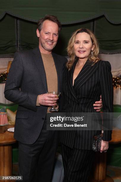 Russell Thomas and Kim Cattrall attend the Perfect X Dolce & Gabbana Beauty Christmas party at Dorchester Hotel on December 1, 2024 in London,...