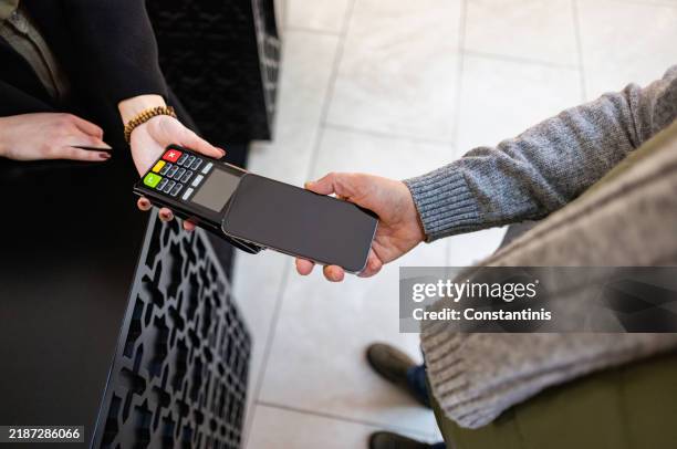 a modern shopper’s choice - credit card reader overhead stock pictures, royalty-free photos & images