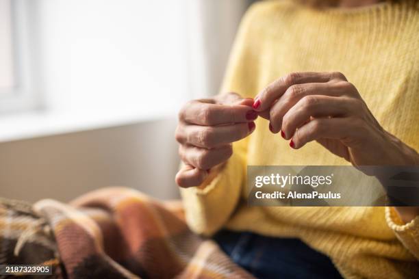 cozy hands detail - hands clasped stock pictures, royalty-free photos & images