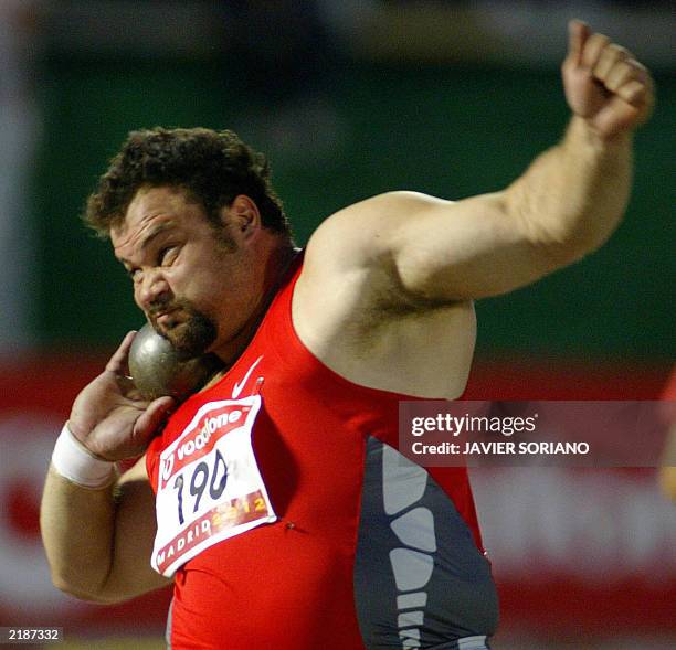 Spanish Manolo Martinez concentrates in the men's shot put event at the Grand Prix Meeting Madrid 2012 in Madrid, 19 July, 2003. He went on to win...