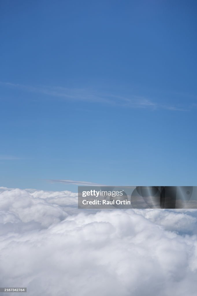 Aerial shot of blue sky with sea clouds