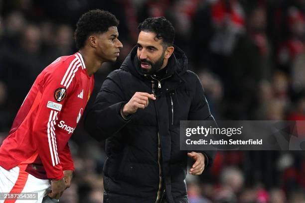 Ruben Amorim, Head Coach of Manchester United, speaks to Marcus Rashford of Manchester United as he prepares to enter the pitch as a substitute...
