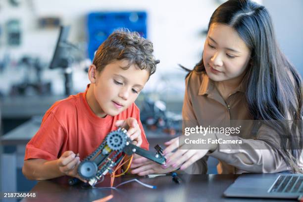 robotics science project - robot teacher stock pictures, royalty-free photos & images