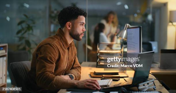 office, night and businessman with computer for research, online information and solution for startup. screen, male employee or digital marketing specialist with laptop for seo, keywords or web tools - black man moody stock pictures, royalty-free photos & images