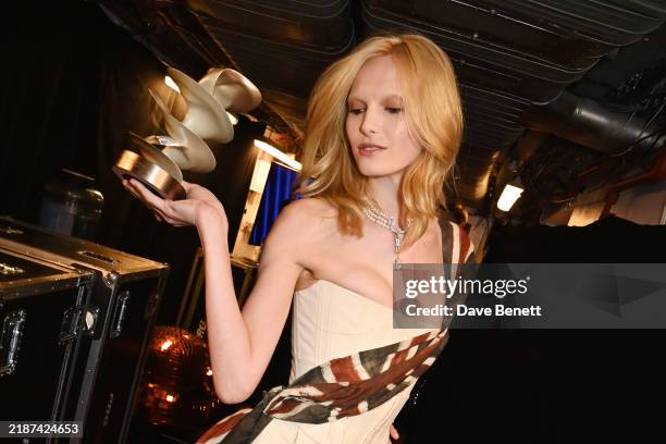 Alex Consani, winner of the Model of the Year Award, poses backstage at The Fashion Awards 2024 presented by Pandora at Royal Albert Hall on December...