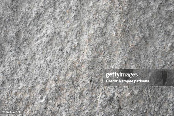 grey rough stone texture background - graniet stockfoto's en -beelden