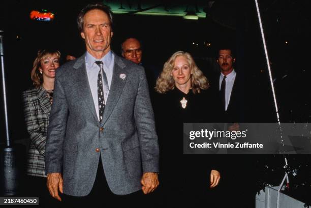 American actor Clint Eastwood and his partner, actress Sondra Locke, attending the premiere of 'Twins' at the Century Plaza Hotel in Los Angeles,...