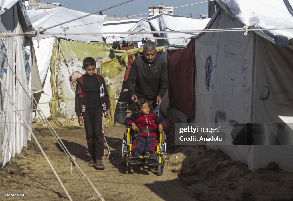 Palestinian 9-year-old Rafeef with wheelchair try to hold on to life amid Israeli attacks