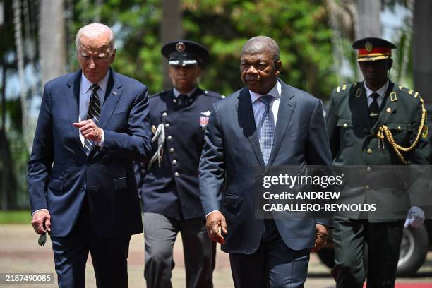 President Joe Biden is welcomed by Angola President Joao Lourenco ahead of their bilateral meeting at the Presidential Palace in Luanda on December...