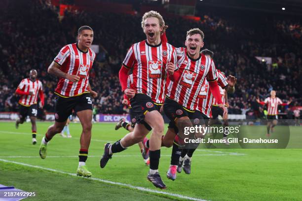 Tom Davies of Sheffield United celebrates after scoring their side's first goal during the Sky Bet Championship match between Sheffield United FC and...