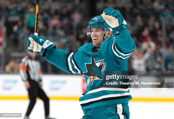 Klim Kostin of the San Jose Sharks reacts after teammate Will Smith scored a goal against the Seattle Kraken during the second period of an NHL...