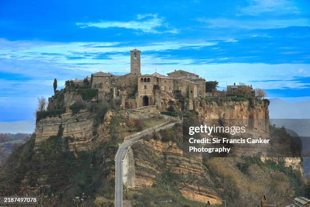 civita di bagnoregio with romantic sky right before dusk north of rome in lazio, italy - ghost town stock pictures, royalty-free photos & images