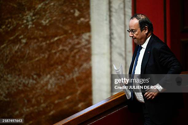 French Member of Parliament of left-wing party Socialistes et Apparentes' and French former President Francois Hollande attends a session of...