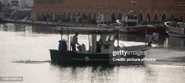 December 2024, Spain, Palma: Fishing boats are anchored in the port of Palma on Mallorca. From December 9, the fishermen want to go on strike to...