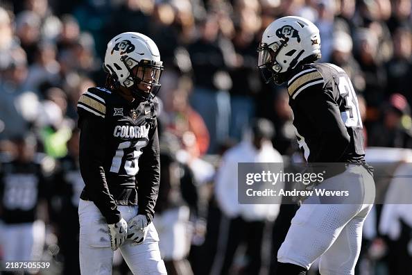 Kaleb Mathis of the Colorado Buffaloes reacts after a tackle during ...