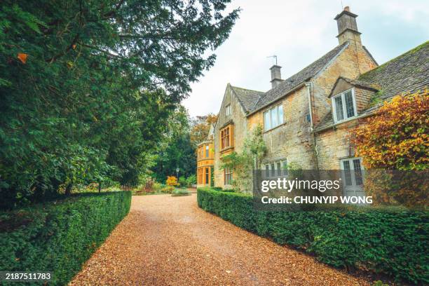 rural scene in upper slaughter, england, uk - grounds stock pictures, royalty-free photos & images