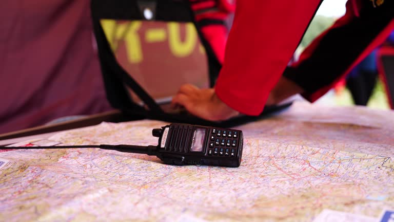 https://media.gettyimages.com/id/2187536249/video/handheld-transceiver-on-paper-map-and-person-hands-in-background-czechia.jpg?b=1&s=640x640&k=20&c=SOqlrDn_JybLVAsjSg8p1NOwR78B2iE3UQdjWkZHZc8=