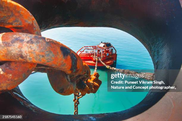 a single point mooring (spm) buoy to unload the crude oil from the tankers and transport the same to the refinery at the shore. - oil tanker ship stock pictures, royalty-free photos & images
