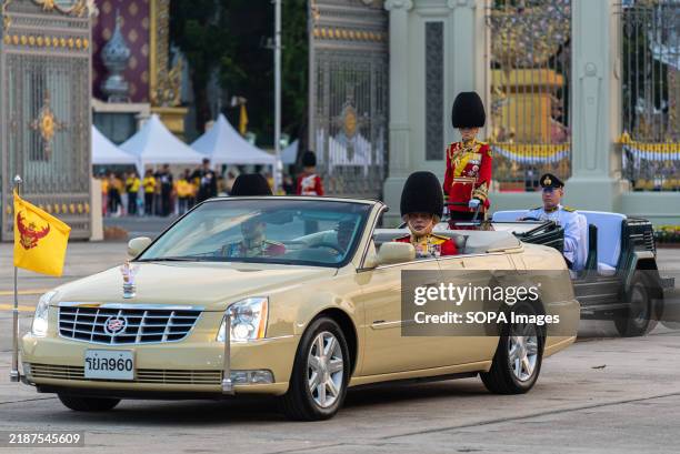 Thai King Maha Vajiralongkorn and Thai Queen Suthida review the guard of honor during the Royal Guards parade and oath taking to the King at the...