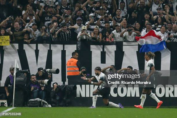 Memphis Depay of Corinthians celebrates after scoring the team's third goal during the Brasileirao 2024 match between Corinthians and Bahia at Neo...